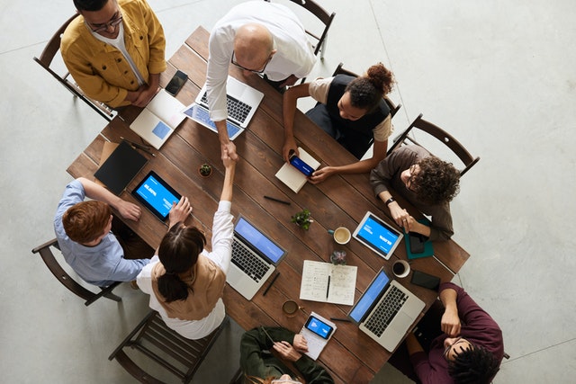 people collaborating around a table